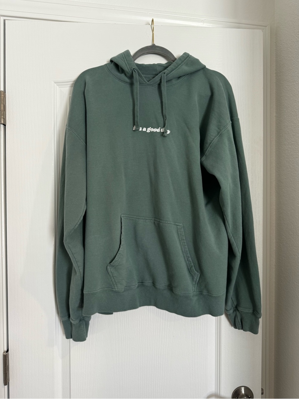 Unisex Forest Green Pullover Hoodie with Subtle Chest Text